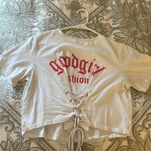 Short sleeve slightly cropped with tie up corset detail